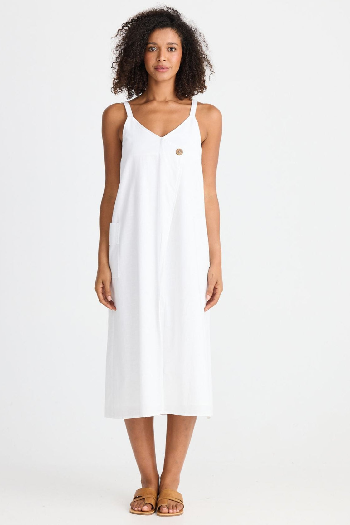 Woman wearing a white dress on a white background